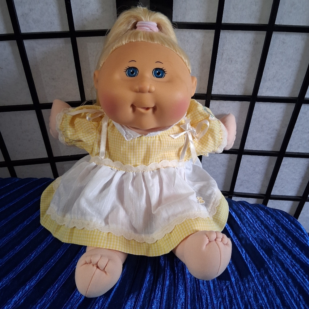 Charming Yellow and White Doll with Blonde Hair